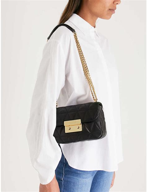 michael michael kors sloan small quilted messenger bag|Michael Kors sloan crossbody.